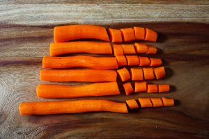 Carrot prep for black bean vegetable soup with avocado