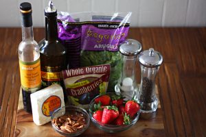 Ingredients for the arugula, strawberry and chicken salad