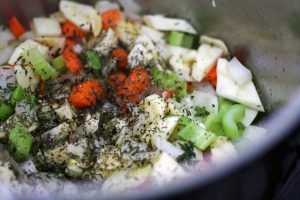 Vegetables and herbs in the pot