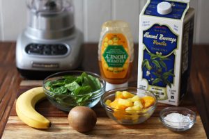 Ingredients for a tropical green smoothie bowl